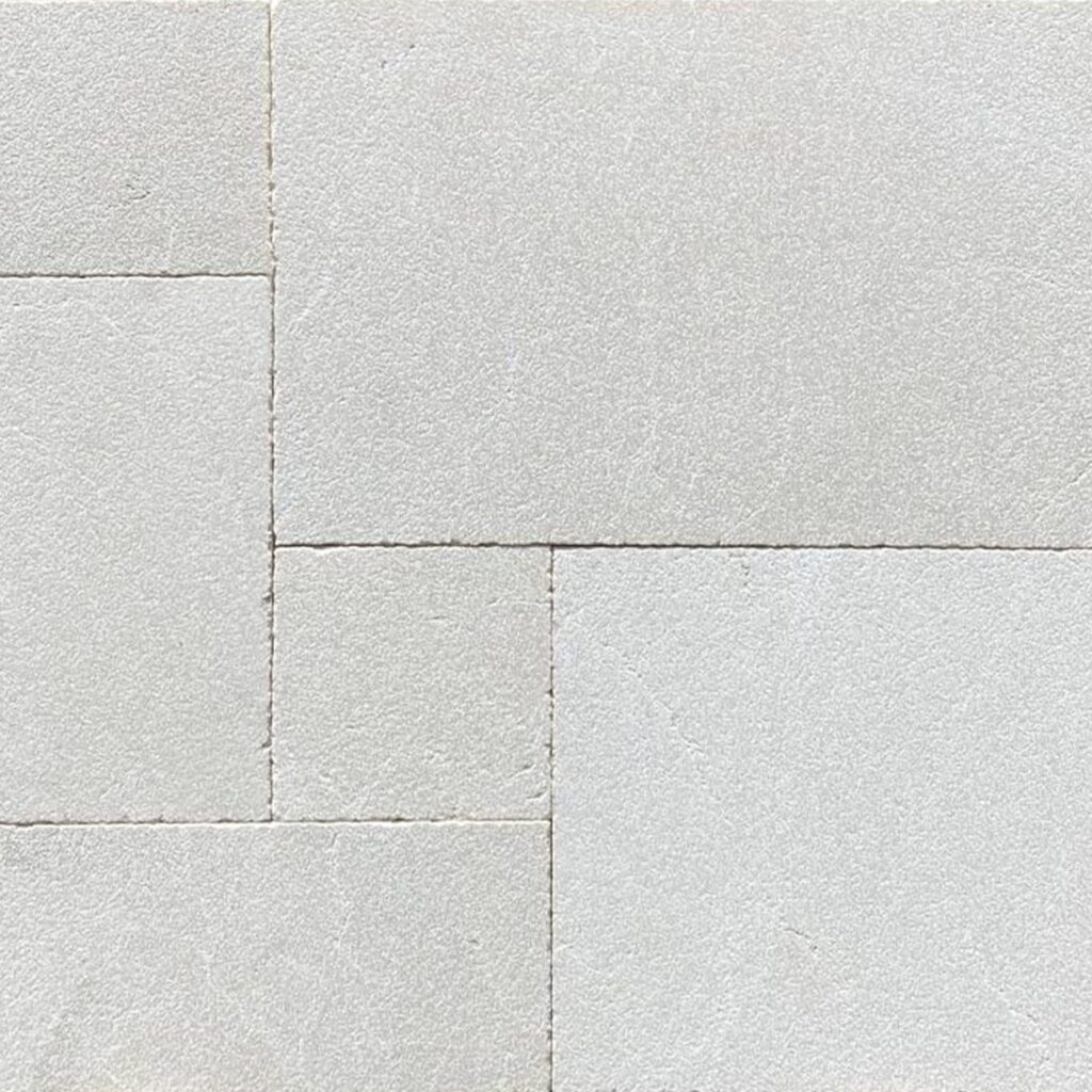 A piece of Antalya Cream Marble French Pattern paver tile