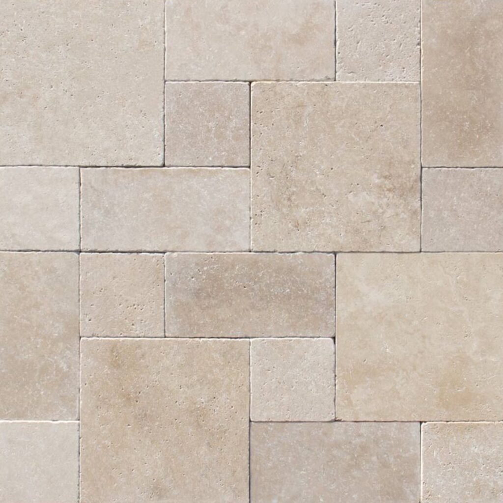 A piece of Cordoba Cream Roman Pattern paver tile